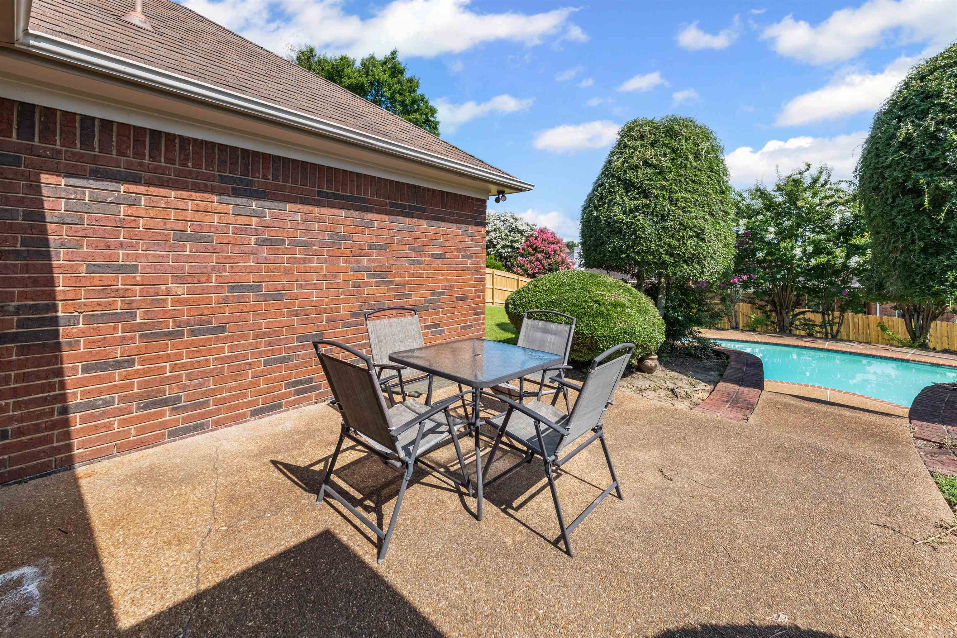 8645 Bazemore Road Memphis, TN 38018 - Photo 23 of 28 Fenced backyard featuring a patio and outdoor dining space