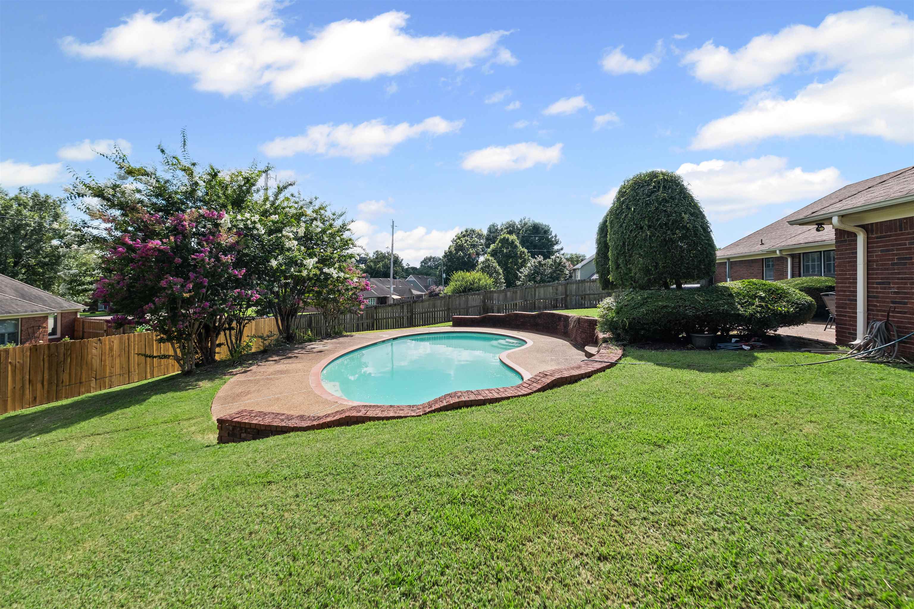 8645 Bazemore Road Memphis, TN 38018 - Photo 25 of 28 View of swimming pool with a fenced backyard