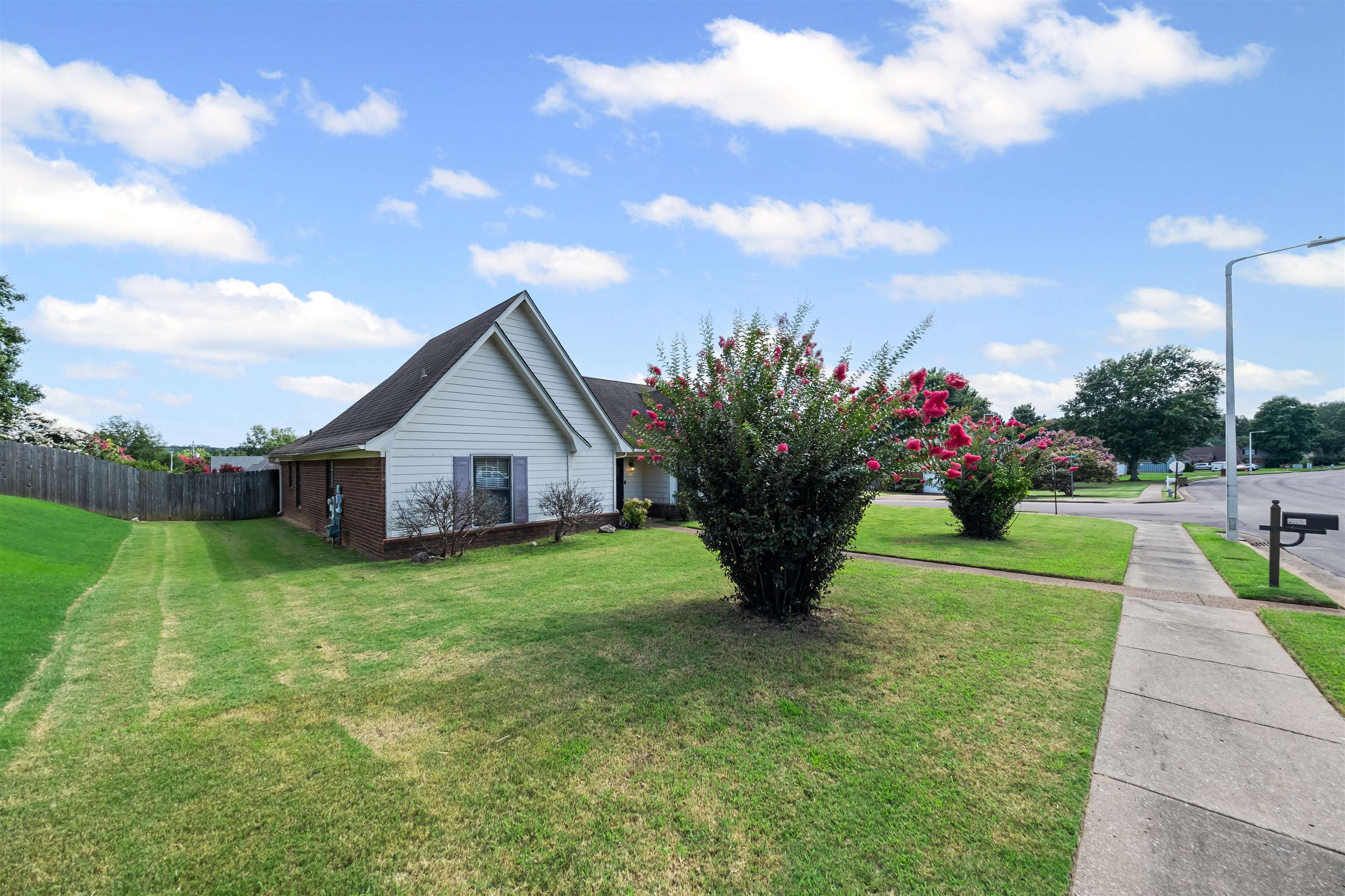 8645 Bazemore Road Memphis, TN 38018 - Photo 27 of 28 View of side of property with brick siding