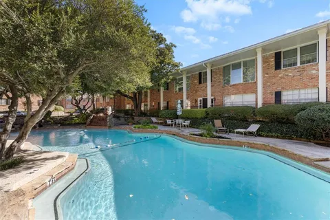 a view of a backyard of the house
