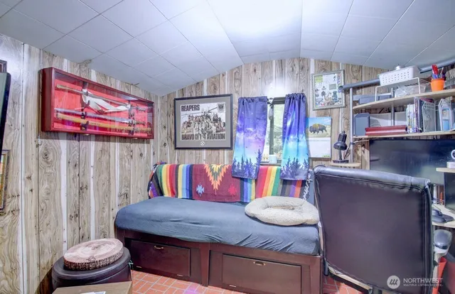 a room with furniture and a rug