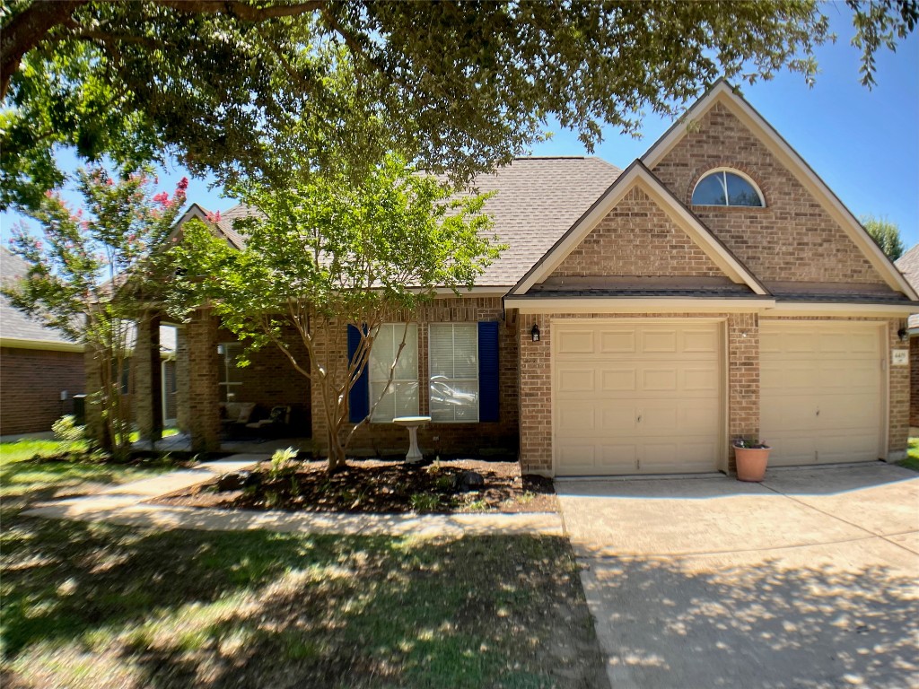 4409 South Summercrest Loop Round Rock, TX 78681 - Photo 1 of 25 Beautifully shaded front yard with a welcoming porch