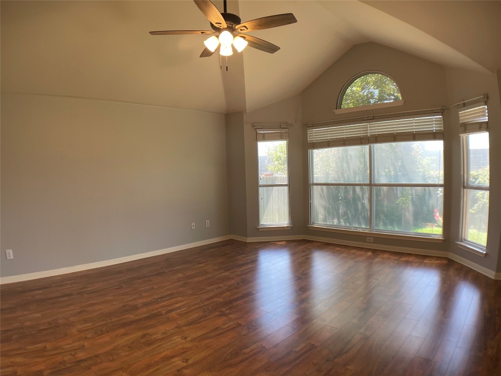 4409 South Summercrest Loop Round Rock, TX 78681 - Photo 12 of 25 Large bay windows in the primary bedroom allow you to look out at the peaceful backyard