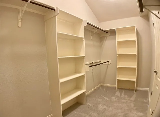 a bathroom with a bathtub a shower and a sink