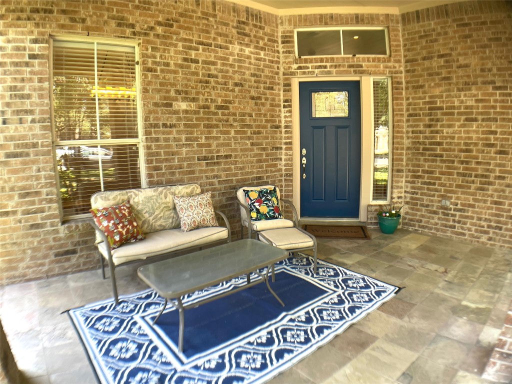 4409 South Summercrest Loop Round Rock, TX 78681 - Photo 2 of 25 Large, covered front porch is a great place to drink your coffee and chat with friends and family