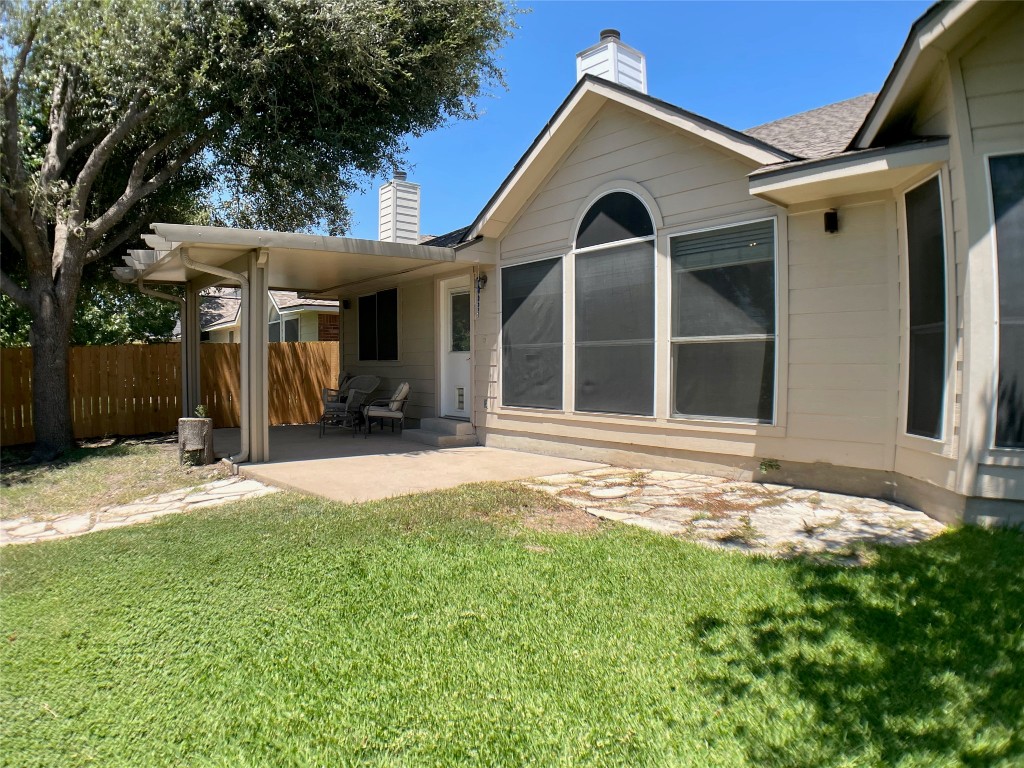 4409 South Summercrest Loop Round Rock, TX 78681 - Photo 22 of 25 Peaceful backyard retreat with a covered back porch and plenty of shade