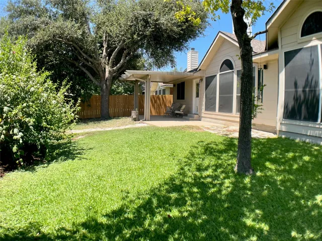 a house view with a outdoor space