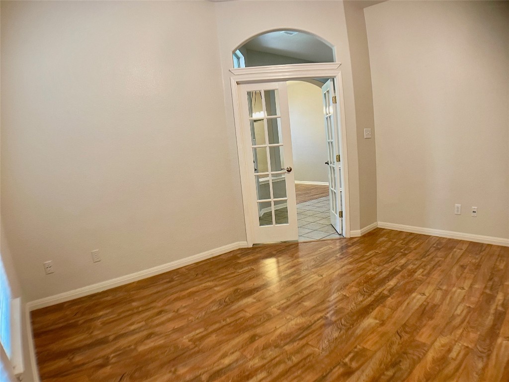 4409 South Summercrest Loop Round Rock, TX 78681 - Photo 6 of 25 Beautiful glass french doors carve out a perfect space for a home office that overlooks the front yard