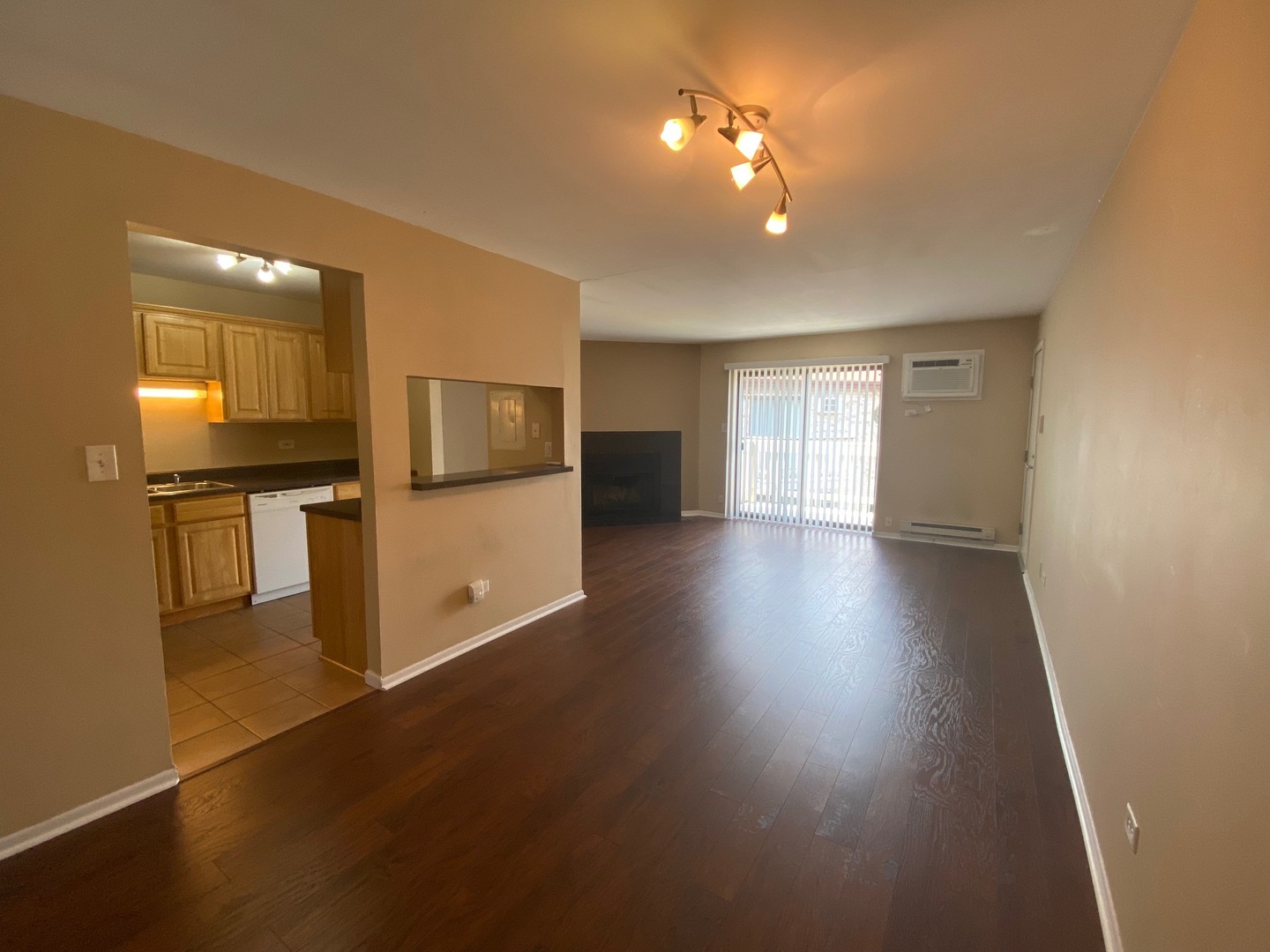 442 East Osage Lane, Unit 3B Palatine, IL 60074 - Photo 2 of 7 a view of a kitchen with a sink refrigerator and a window
