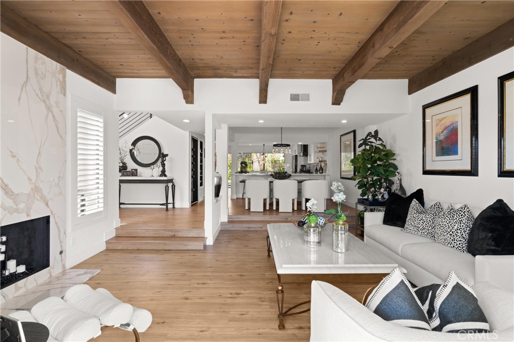 23281 Atlantis Way Dana Point, CA 92629 - Photo 11 of 81 a living room with furniture and wooden floor