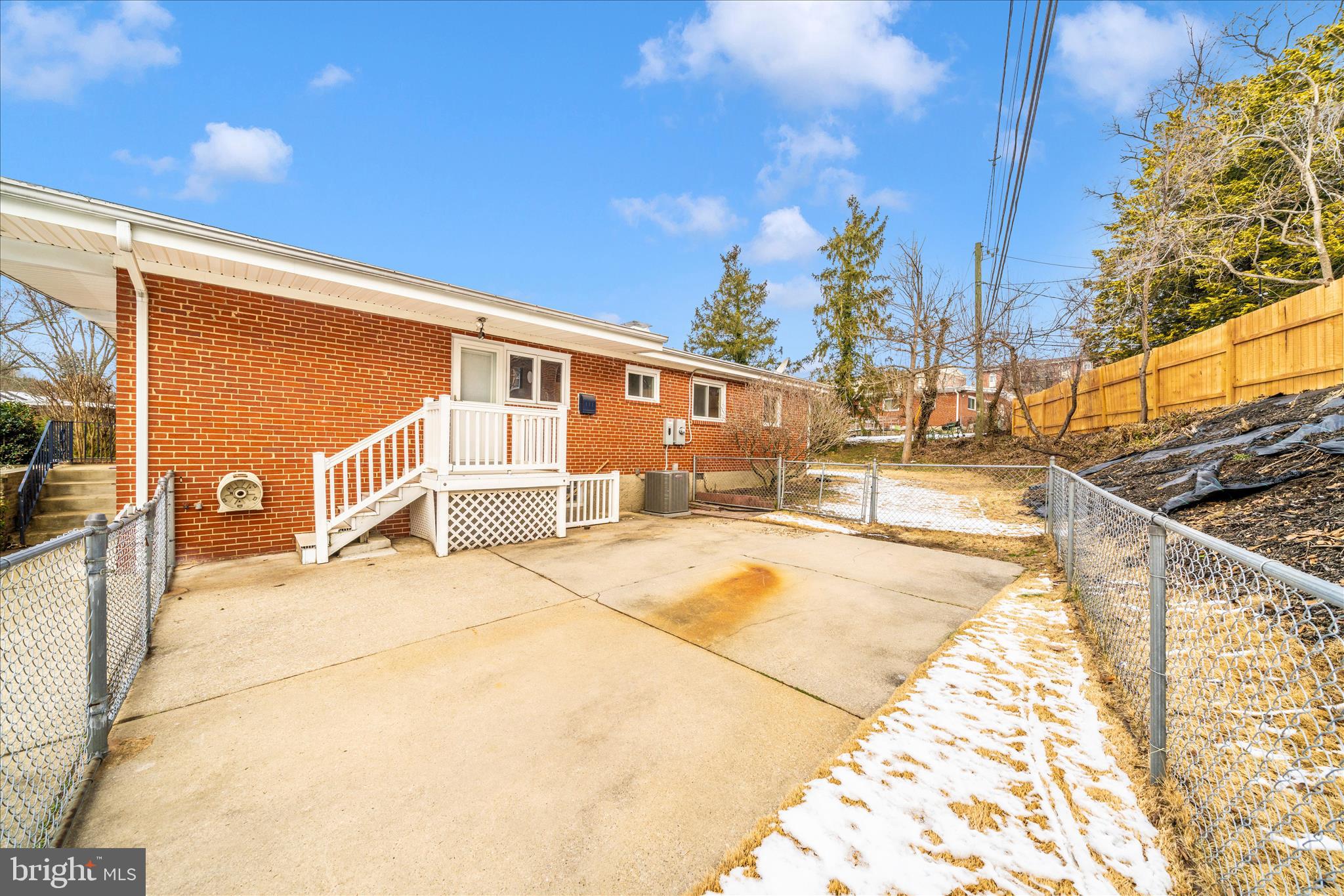 1302 Glenmont Road Baltimore, MD 21239 - Photo 38 of 49 a view of a house with a patio