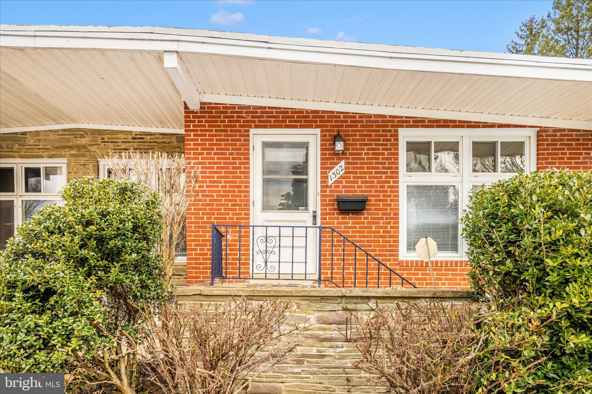 1302 Glenmont Road Baltimore, MD 21239 - Photo 48 of 49 front view of a house