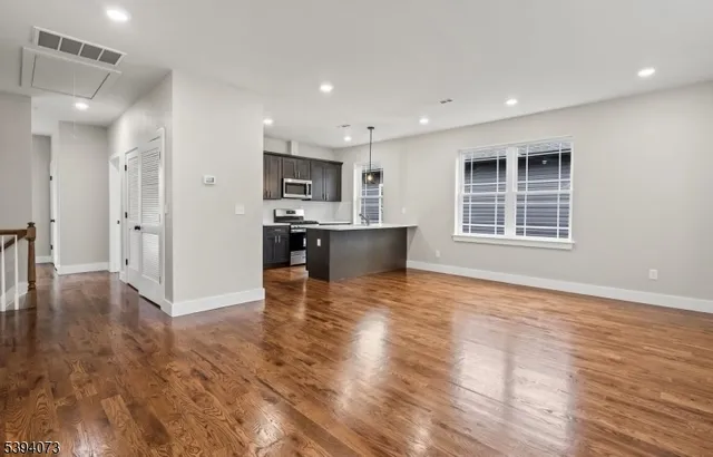 a view of kitchen and windows