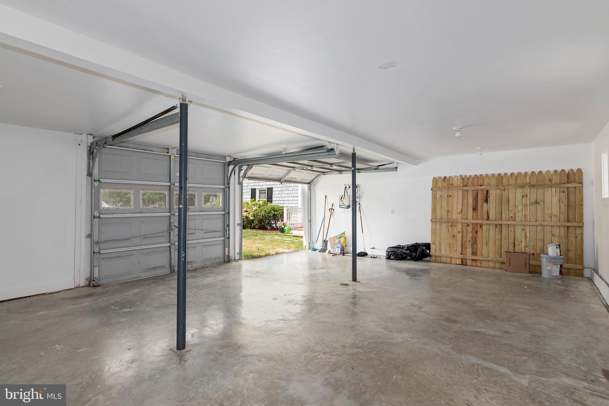 22582 Pot Pie Road Wittman, MD 21676 - Photo 48 of 64 2.5 car garage w/ample room for work bench etc.
