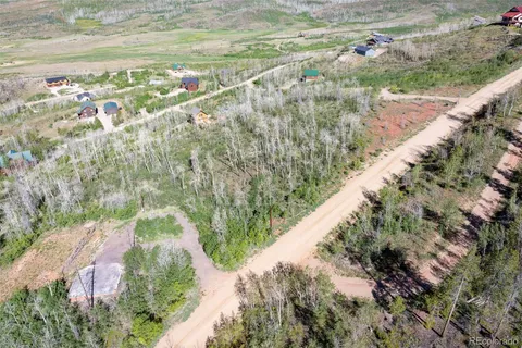 a view of a yard with an ocean