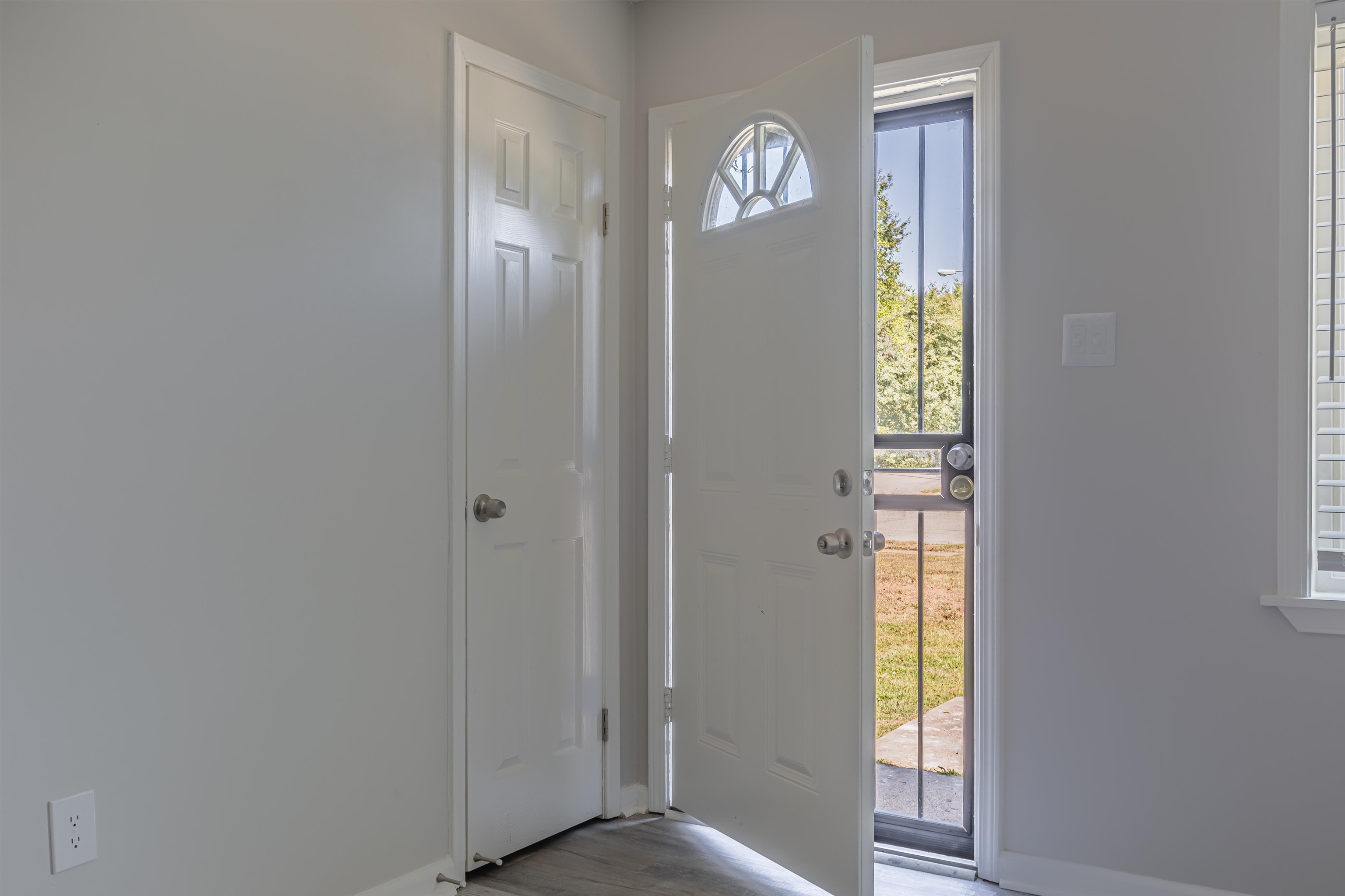 4951 Rosefield Road Memphis, TN 38118 - Photo 12 of 20 a view of an entryway with wooden floor
