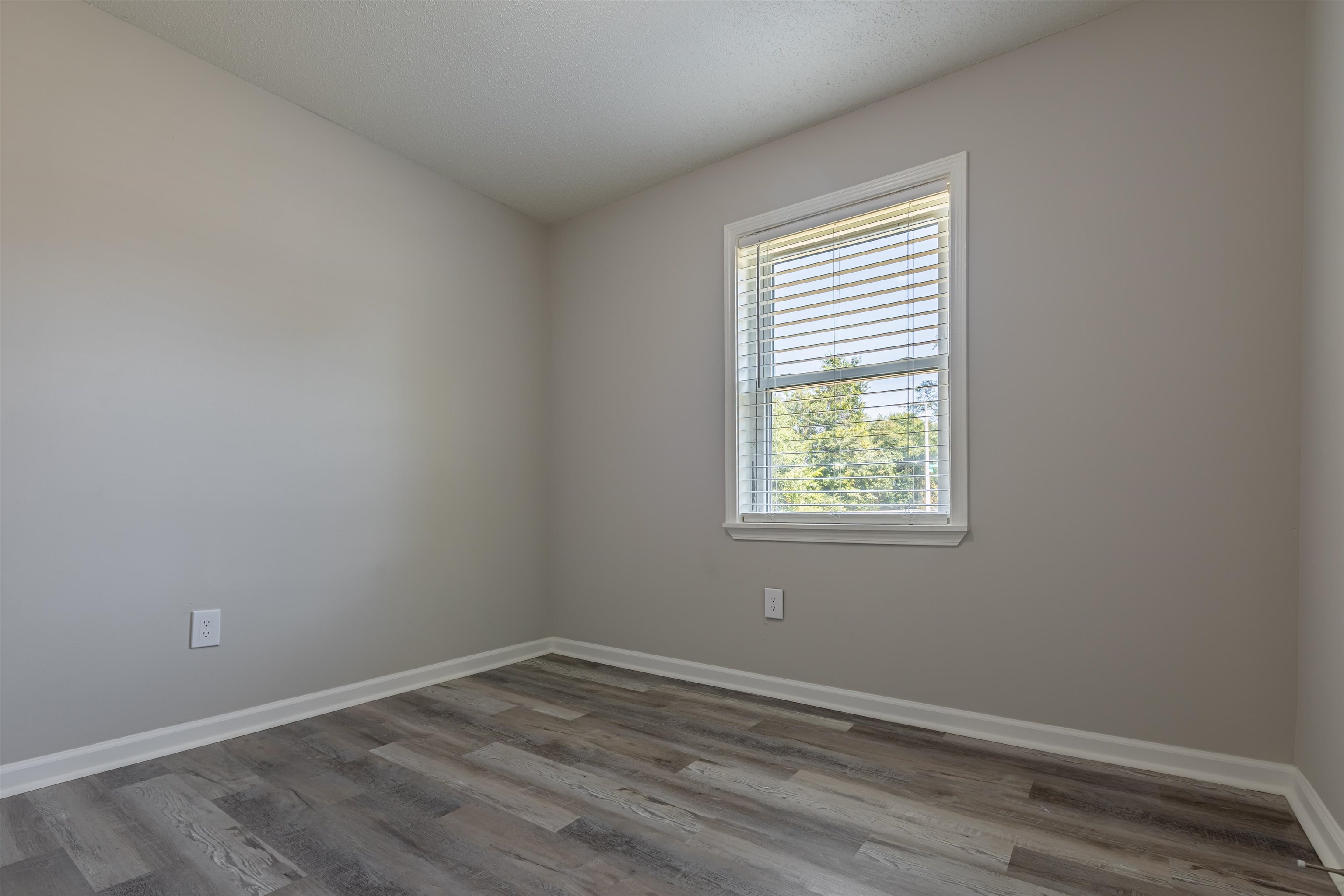 4951 Rosefield Road Memphis, TN 38118 - Photo 17 of 20 an empty room with a window