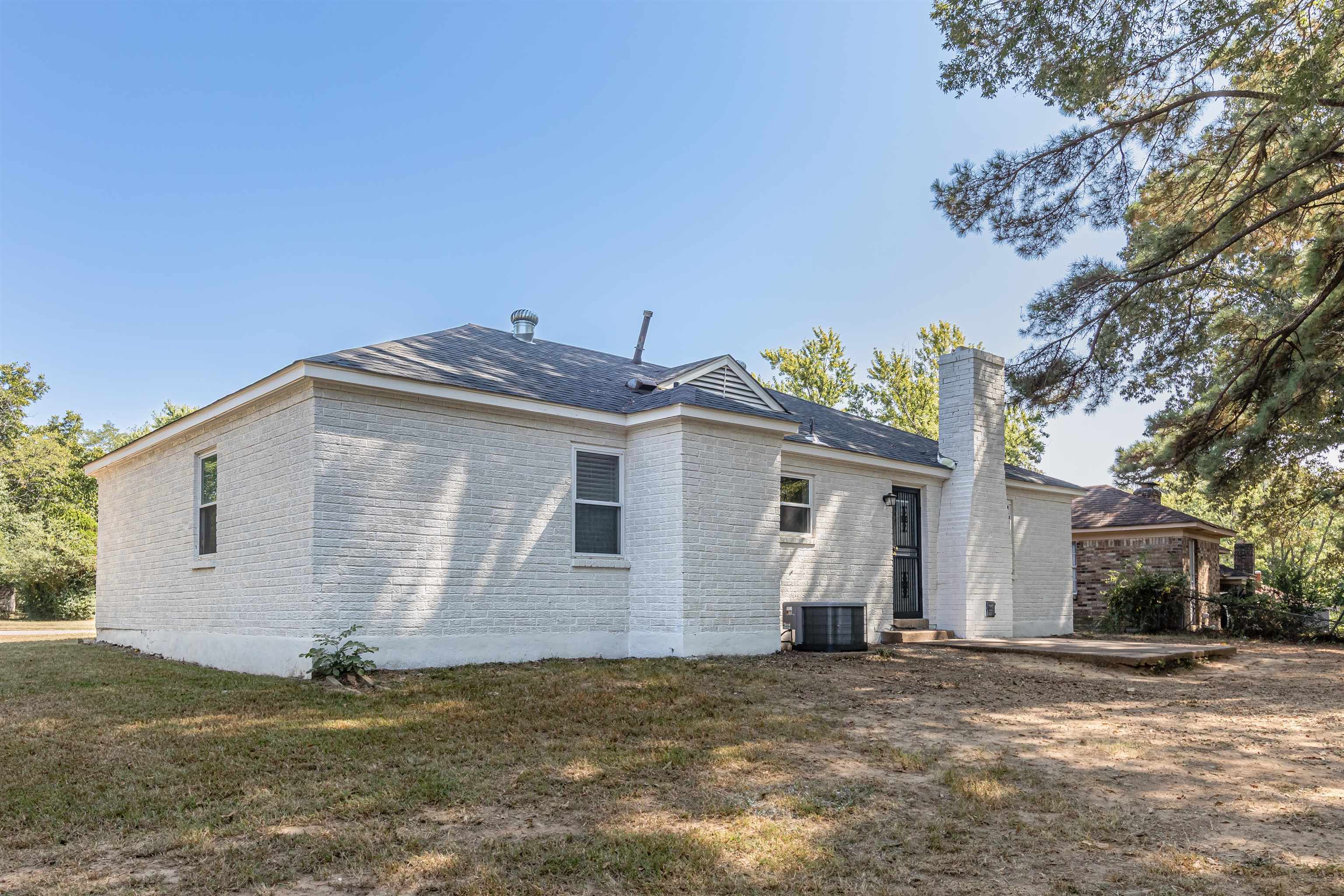 4951 Rosefield Road Memphis, TN 38118 - Photo 18 of 20 a view of a house with a yard