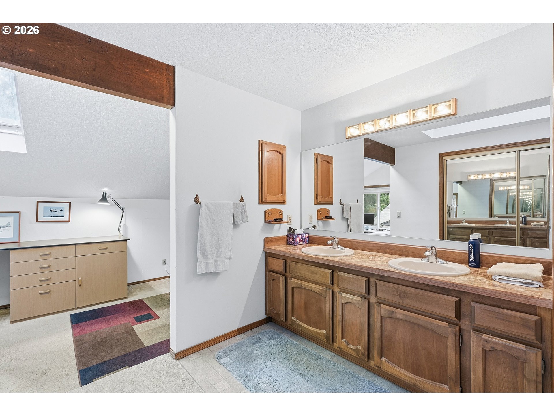 7935 Southwest Carol Glen Place Beaverton, OR 97007 - Photo 28 of 38 a spacious bathroom with a double vanity sink mirror and bathtub