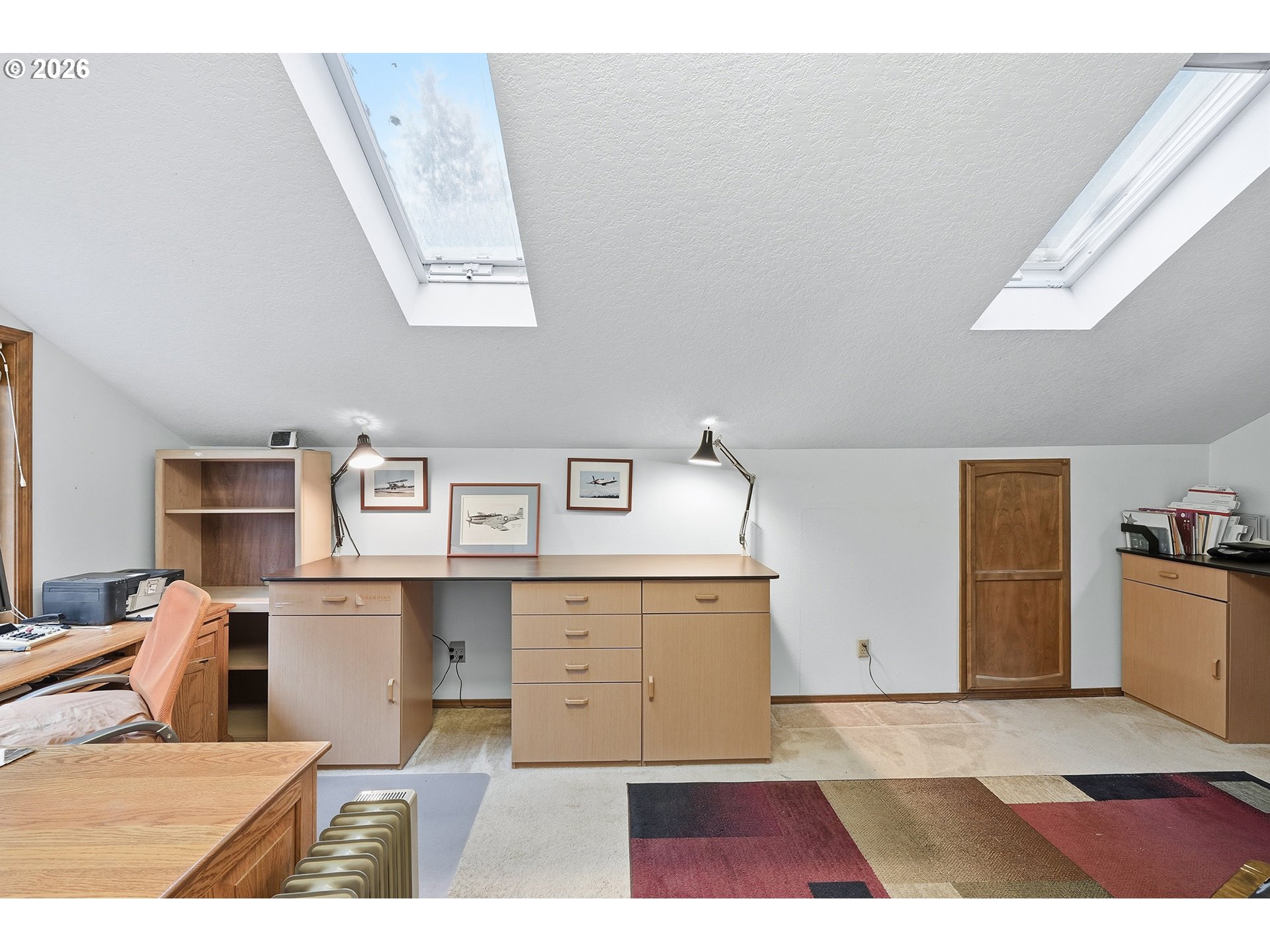7935 Southwest Carol Glen Place Beaverton, OR 97007 - Photo 30 of 38 a living room with stainless steel appliances kitchen island granite countertop furniture and a kitchen view