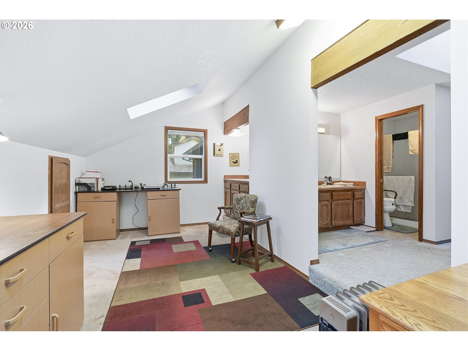 7935 Southwest Carol Glen Place Beaverton, OR 97007 - Photo 32 of 38 a living room with furniture and a rug