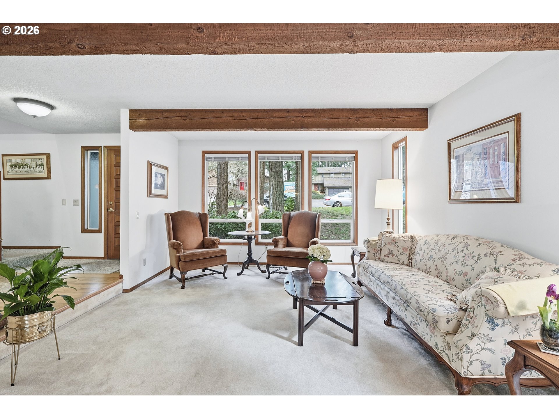 7935 Southwest Carol Glen Place Beaverton, OR 97007 - Photo 5 of 38 a living room with furniture and a potted plant
