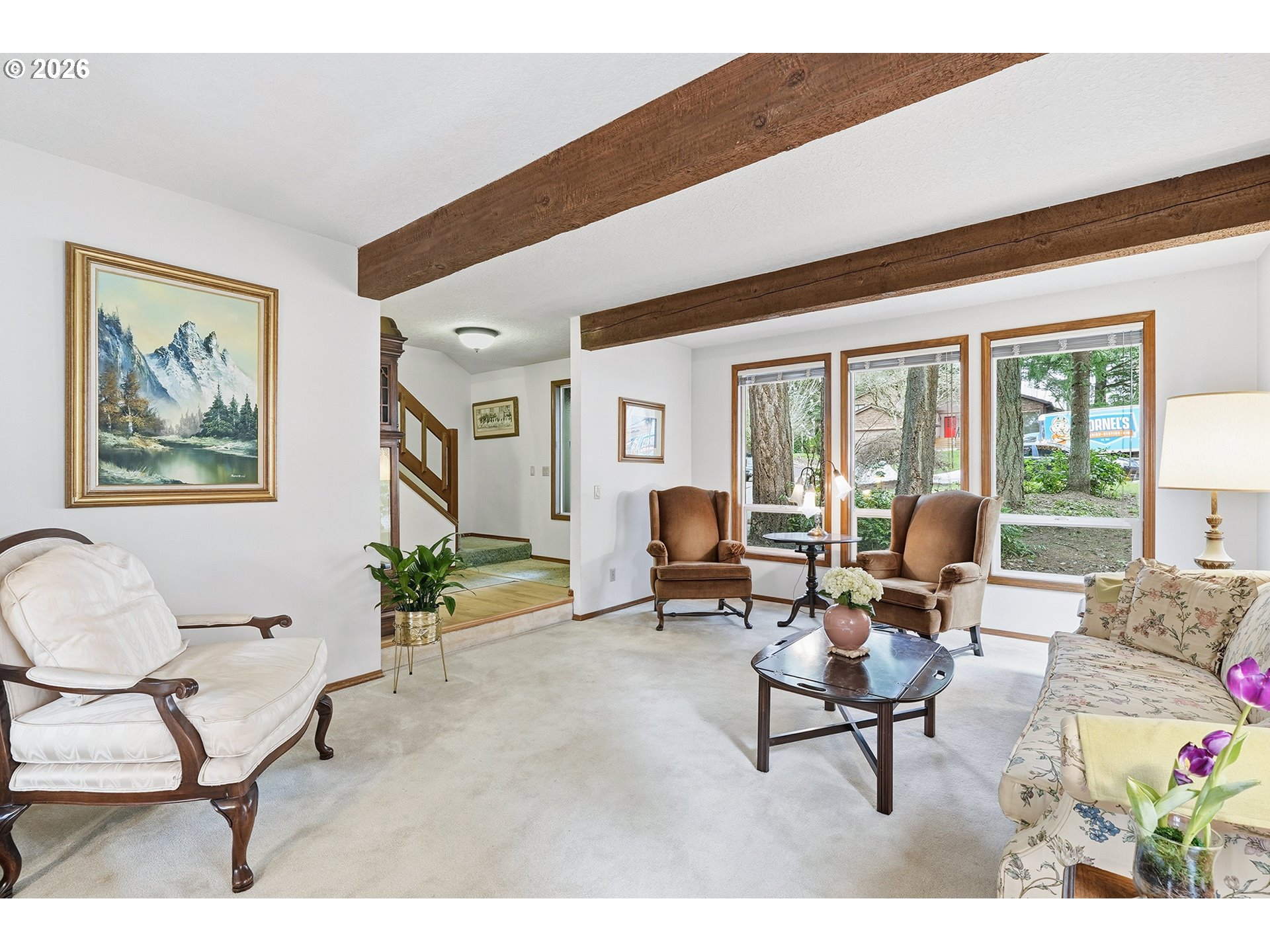 7935 Southwest Carol Glen Place Beaverton, OR 97007 - Photo 6 of 38 a living room with furniture and a large window