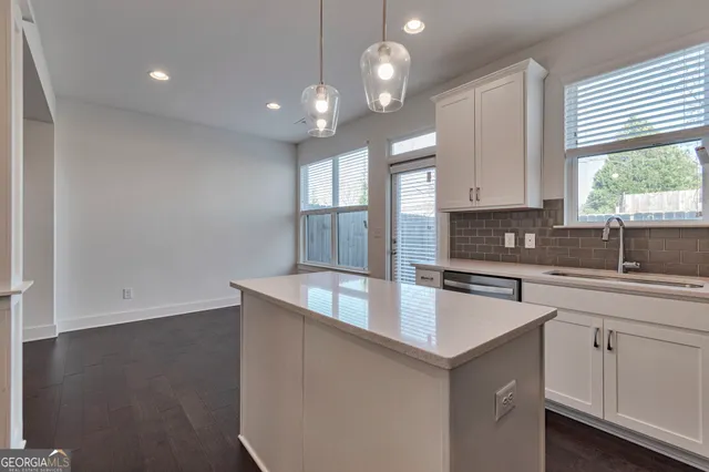 a view of a hallway with workspace