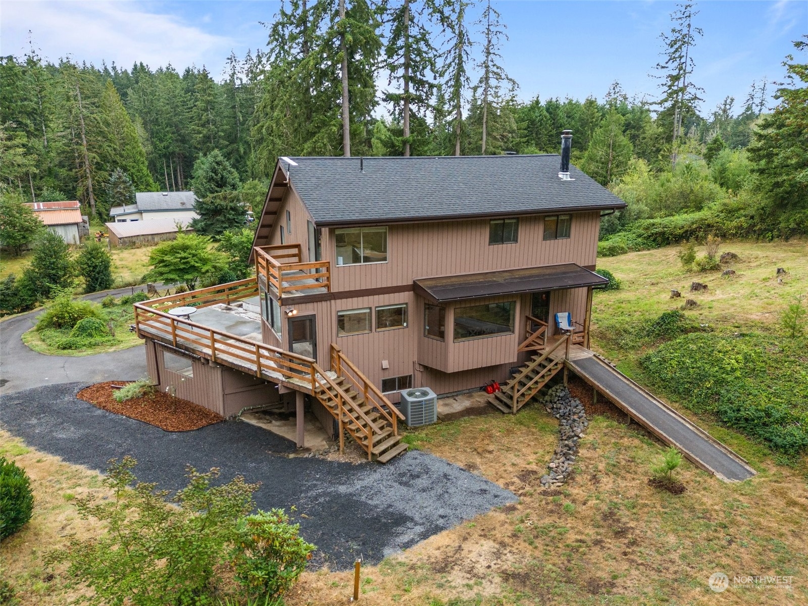 299 Logan Hill Road Chehalis, WA 98532 - Photo 2 of 40 an aerial view of a house with a yard