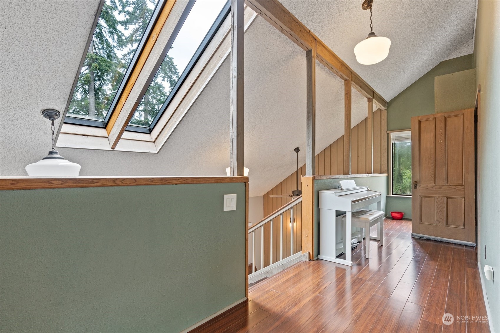 299 Logan Hill Road Chehalis, WA 98532 - Photo 21 of 40 a view of a hallway with furniture and wooden floor