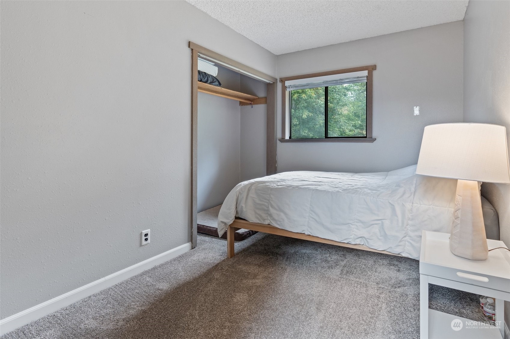 299 Logan Hill Road Chehalis, WA 98532 - Photo 23 of 40 a bedroom with a bed and a window