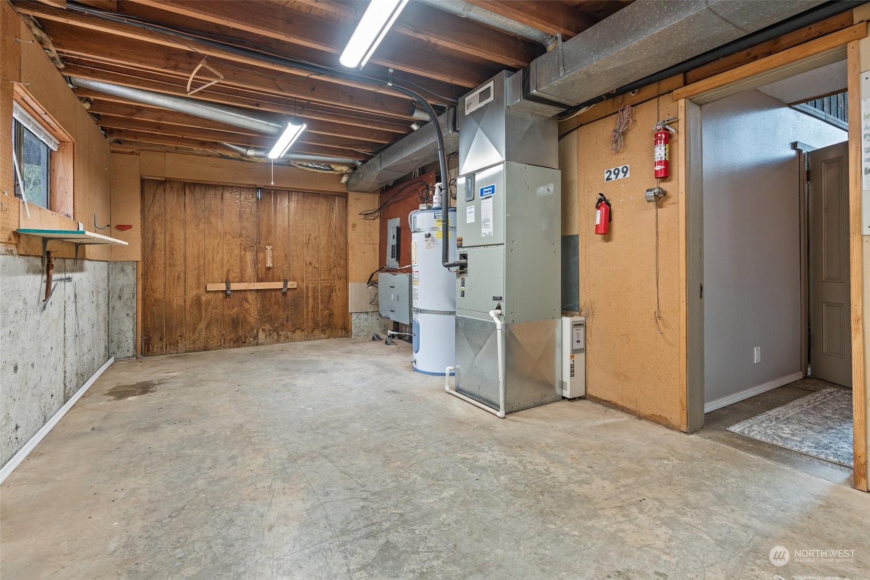 299 Logan Hill Road Chehalis, WA 98532 - Photo 29 of 40 a view of empty room with wooden walls