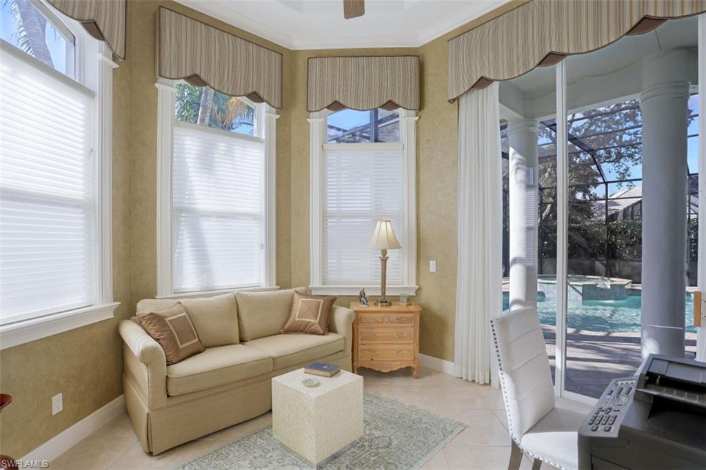 183 Audubon Boulevard Naples, FL 34110 - Photo 21 of 35 a living room with furniture and a window
