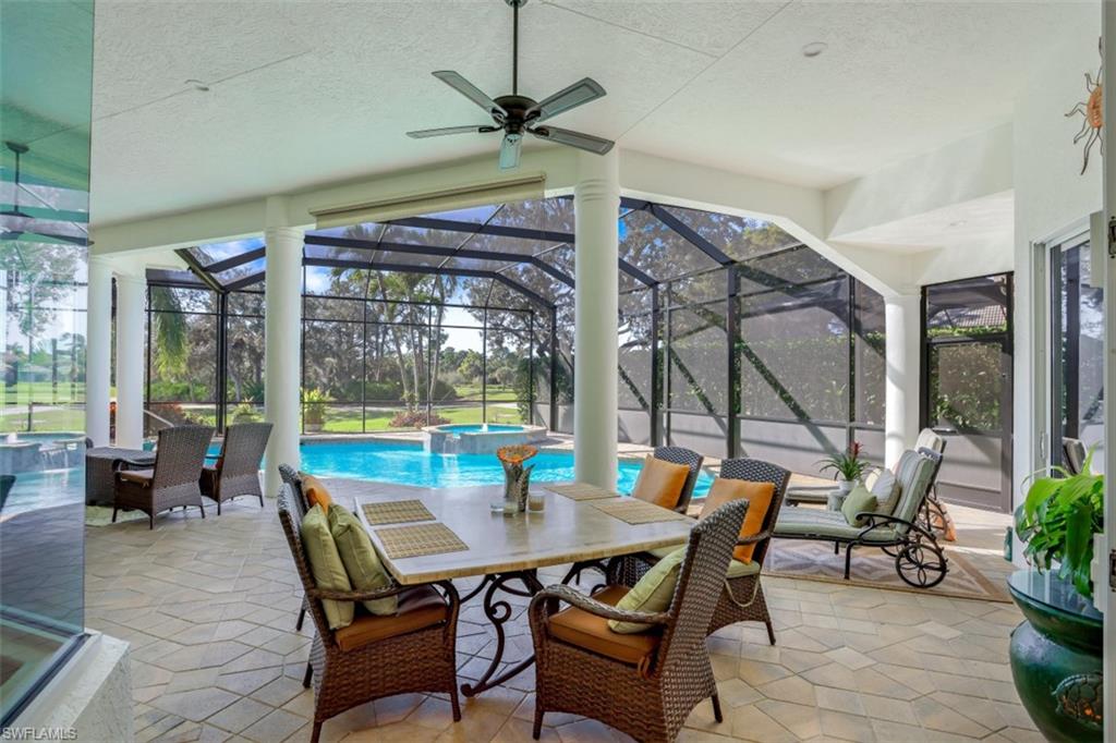 183 Audubon Boulevard Naples, FL 34110 - Photo 6 of 35 a view of a dining room with furniture window and outside view