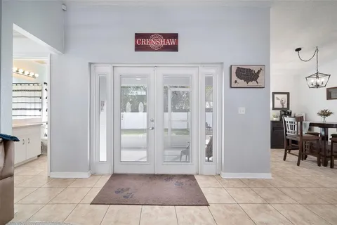a kitchen with stainless steel appliances a sink stove and refrigerator