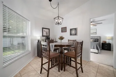 a kitchen with stainless steel appliances a stove a sink and a refrigerator