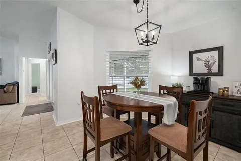 a kitchen with stainless steel appliances a refrigerator sink and stove