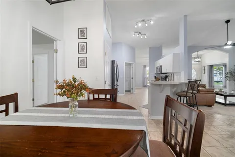 a kitchen with a sink a stove and refrigerator