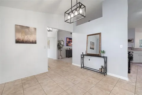 a view of a livingroom with furniture and closet