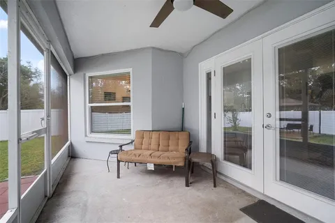 a living room with furniture and a gate