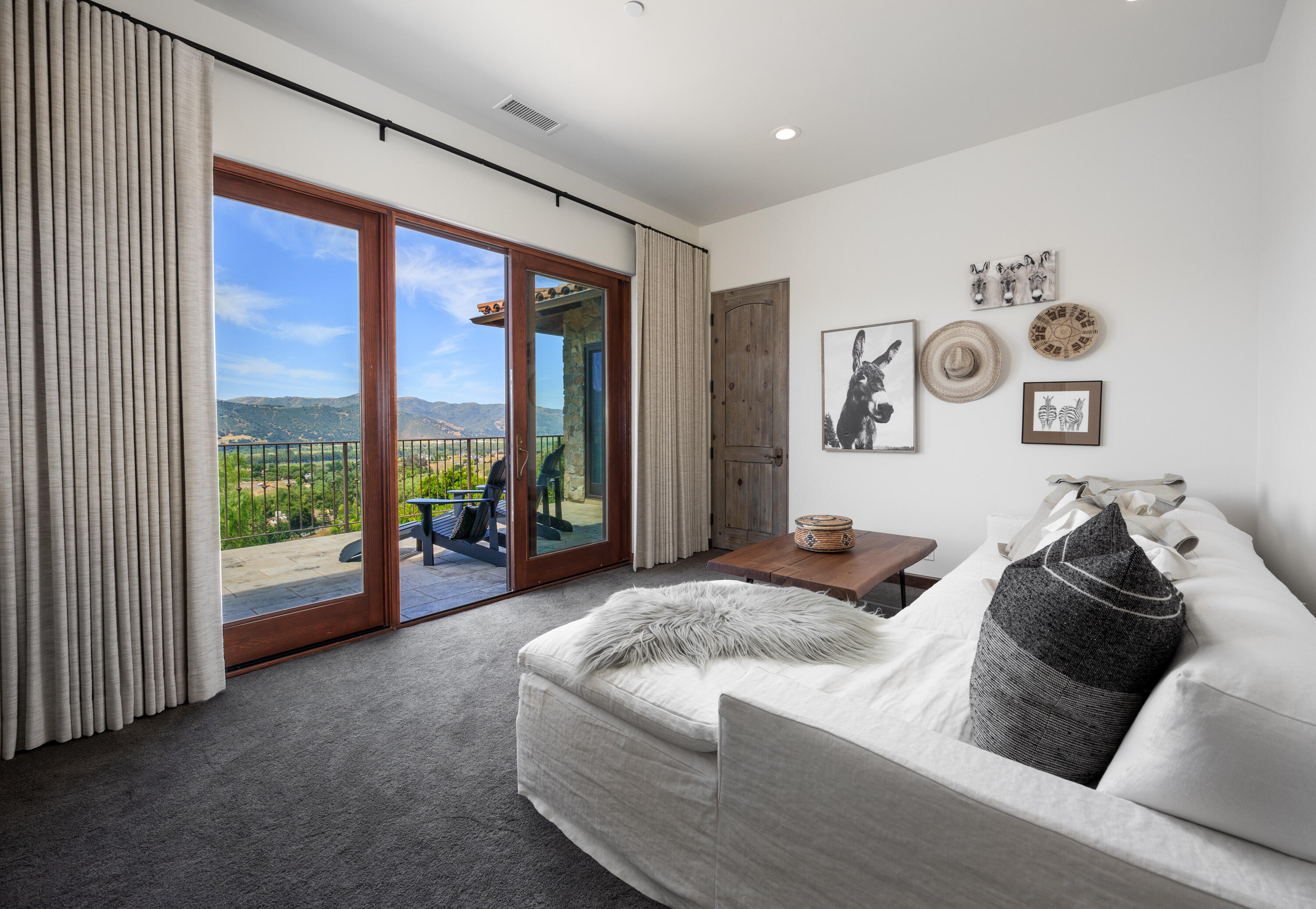 1418 Ribe Road Solvang, CA 93463 - Photo 18 of 46 a spacious bedroom with a large bed and a large window