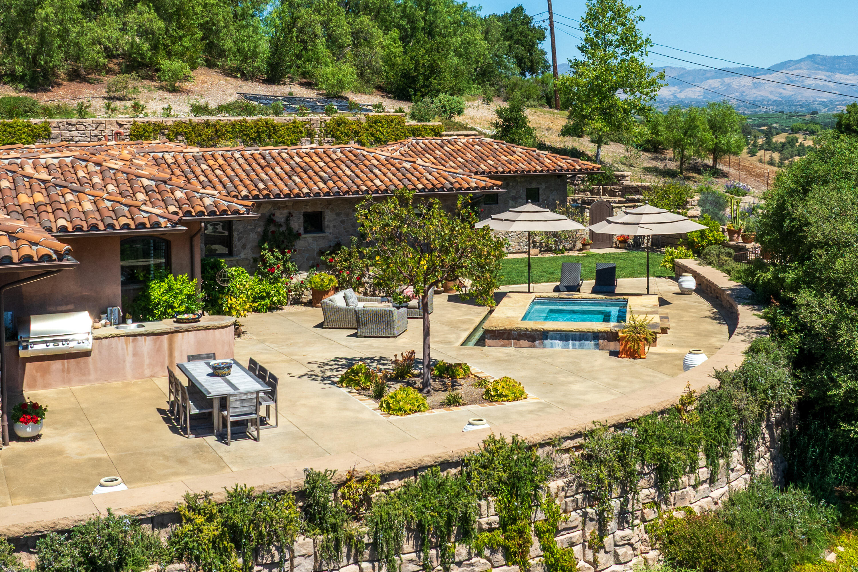 1418 Ribe Road Solvang, CA 93463 - Photo 28 of 46 an aerial view of a house with garden space and patio