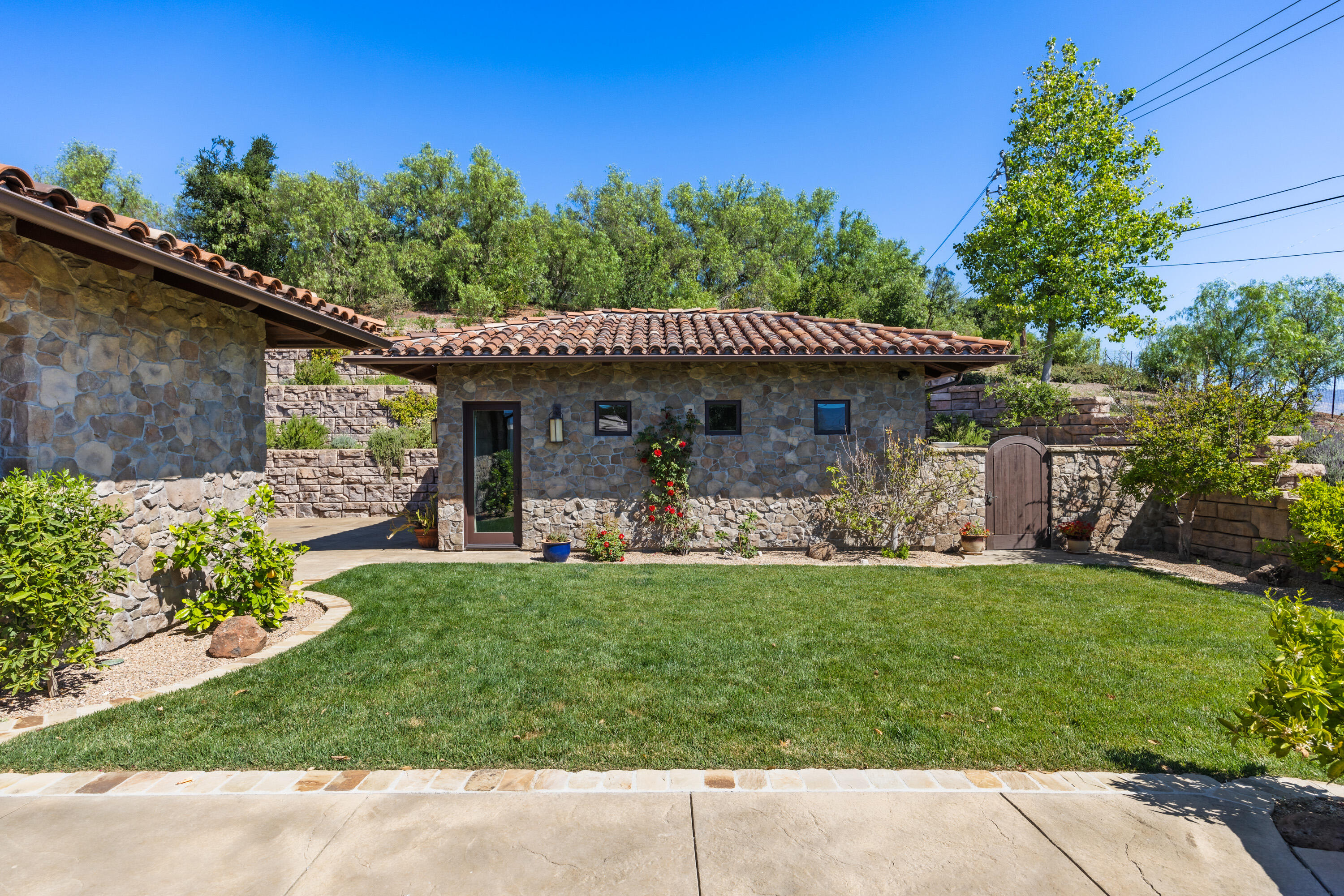 1418 Ribe Road Solvang, CA 93463 - Photo 30 of 46 a front view of a house with a garden