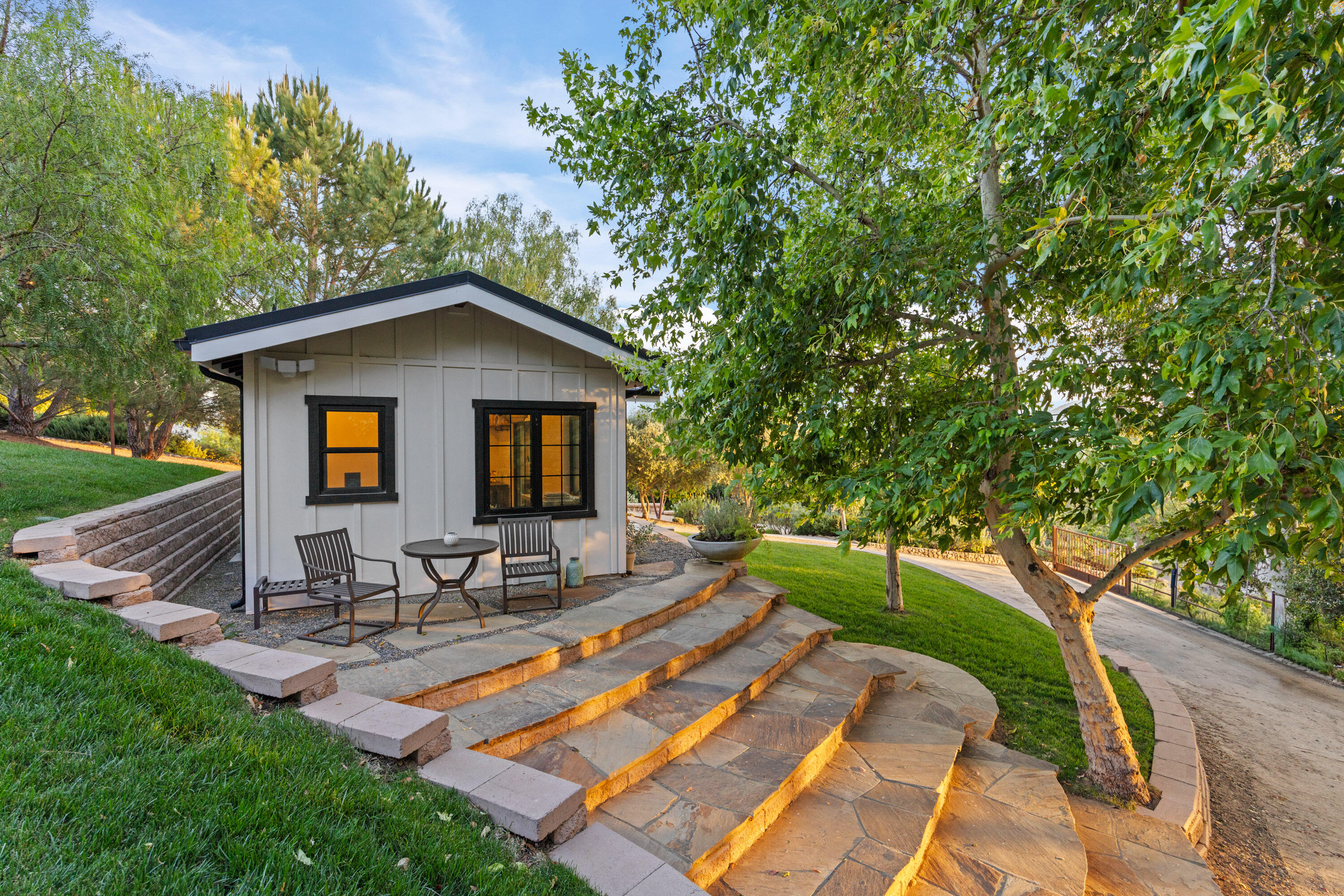 1418 Ribe Road Solvang, CA 93463 - Photo 35 of 46 a backyard of a house with table and chairs