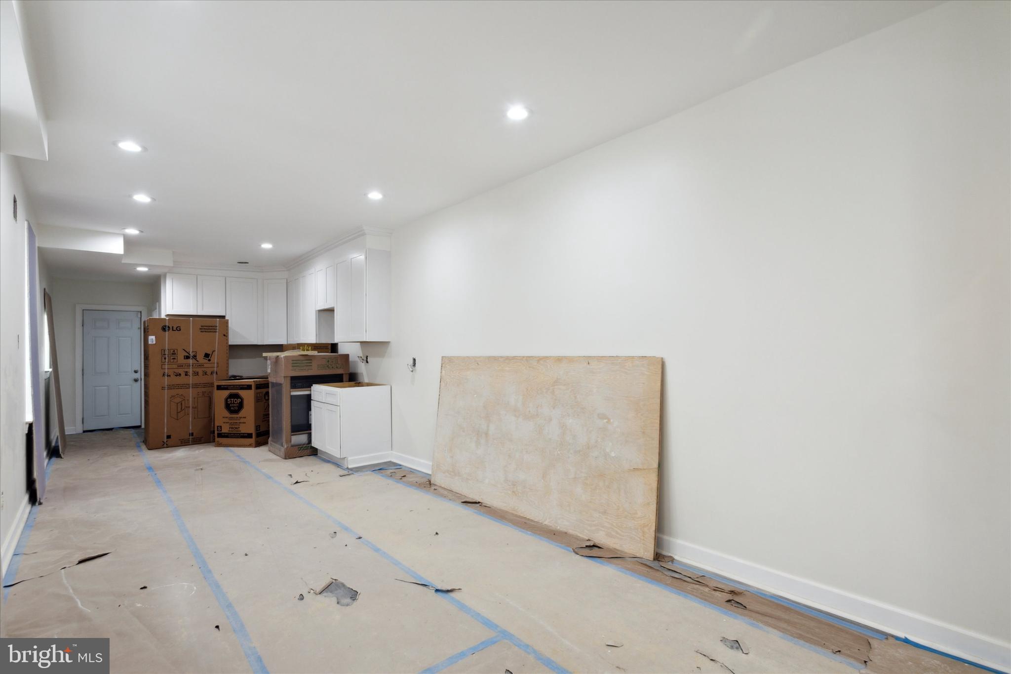 3054 North 15th Street Philadelphia, PA 19132 - Photo 6 of 26 a kitchen with a refrigerator and a counter top space