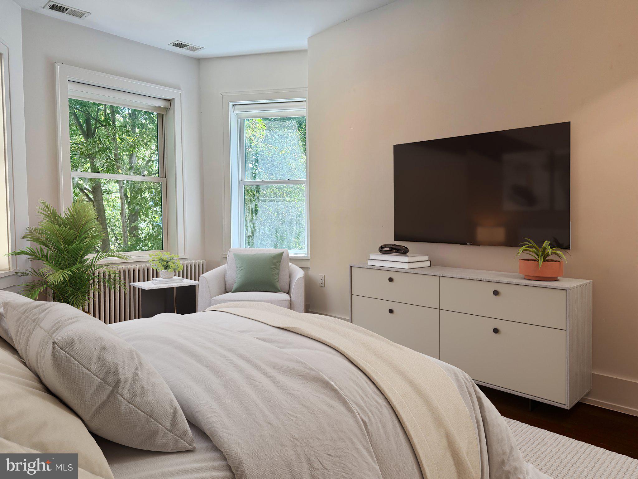 1009 Irving Street Northwest Washington, DC 20010 - Photo 22 of 33 Serene bedroom with natural light.