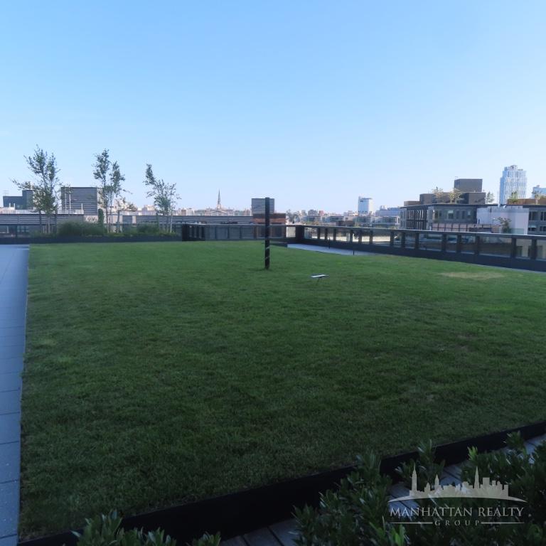 77 Commercial Street, Unit 1623 Brooklyn, NY 11222 - Photo 3 of 4 a view of a green field