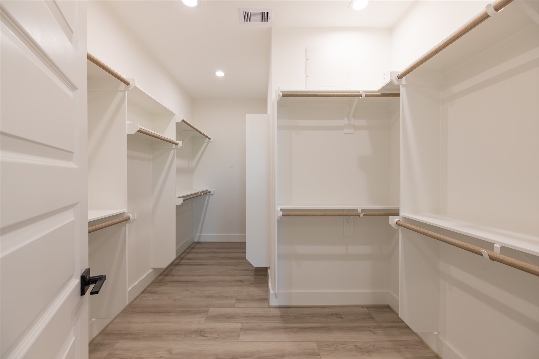 4102 Alice Street Houston, TX 77021 - Photo 7 of 11 a view of an empty walk in closet