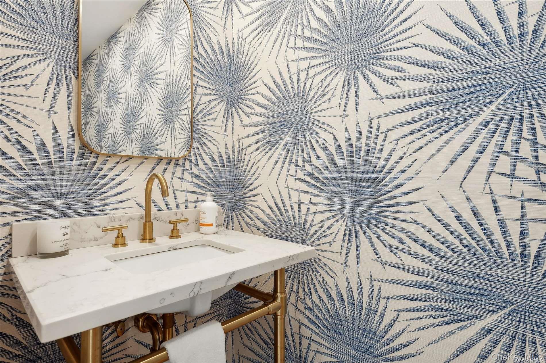 28 Old Meeting House Road Quogue, NY 11959 - Photo 11 of 34 a view of a workspace with a table and chairs