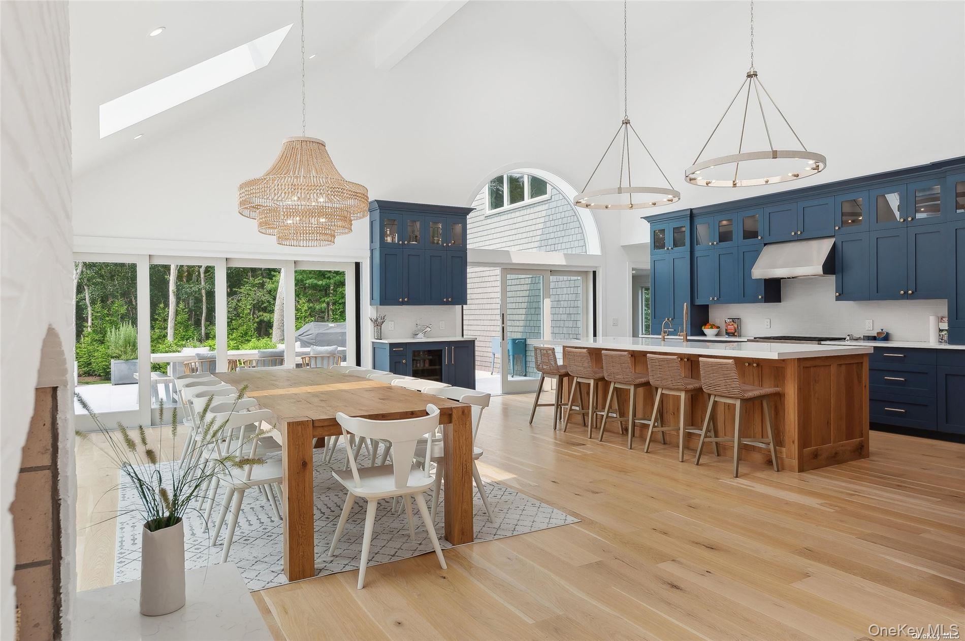 28 Old Meeting House Road Quogue, NY 11959 - Photo 8 of 34 a view of a dining room with furniture window and wooden floor